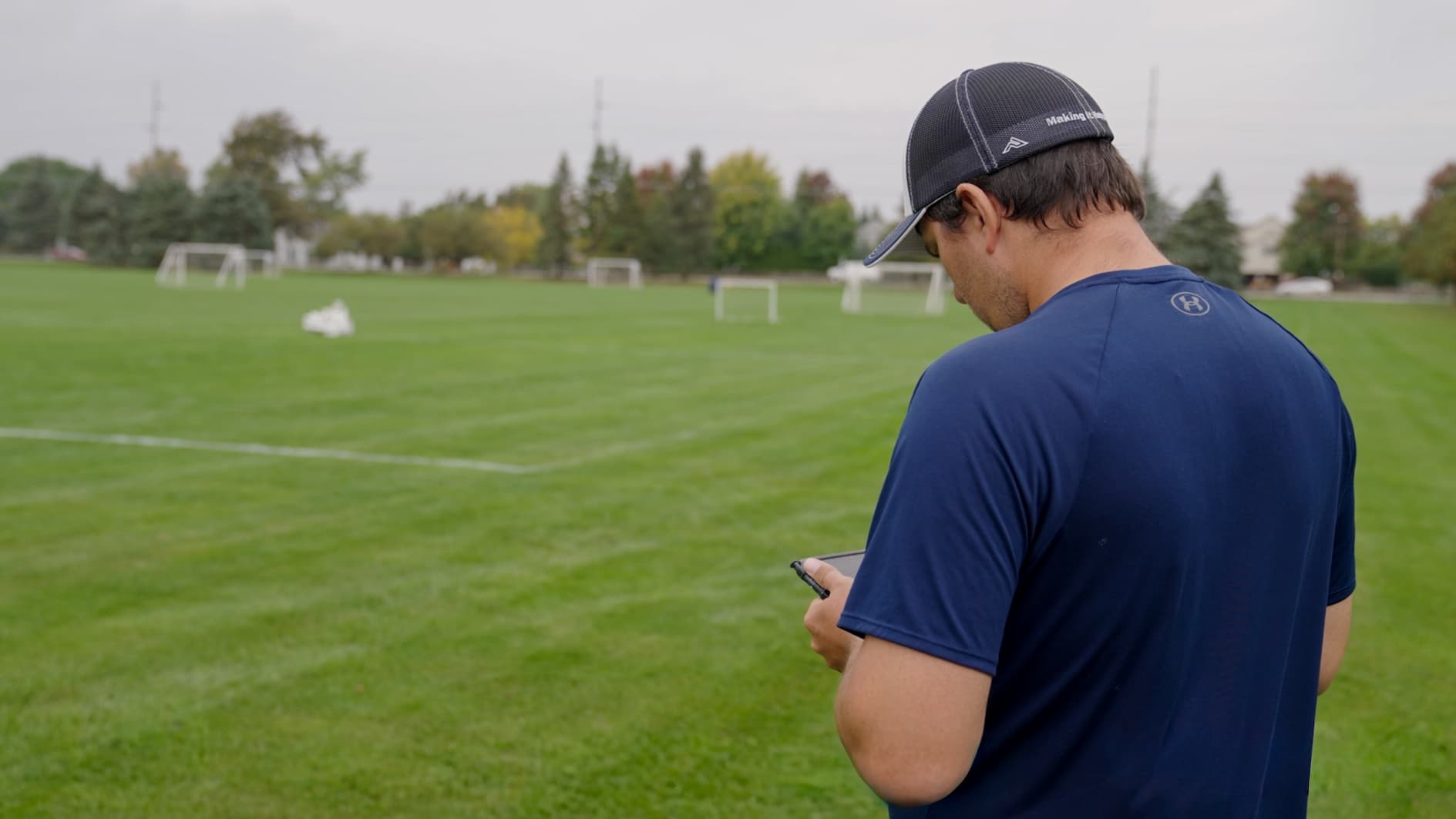 Sylvania Recreation Parks and Rec man with tablet